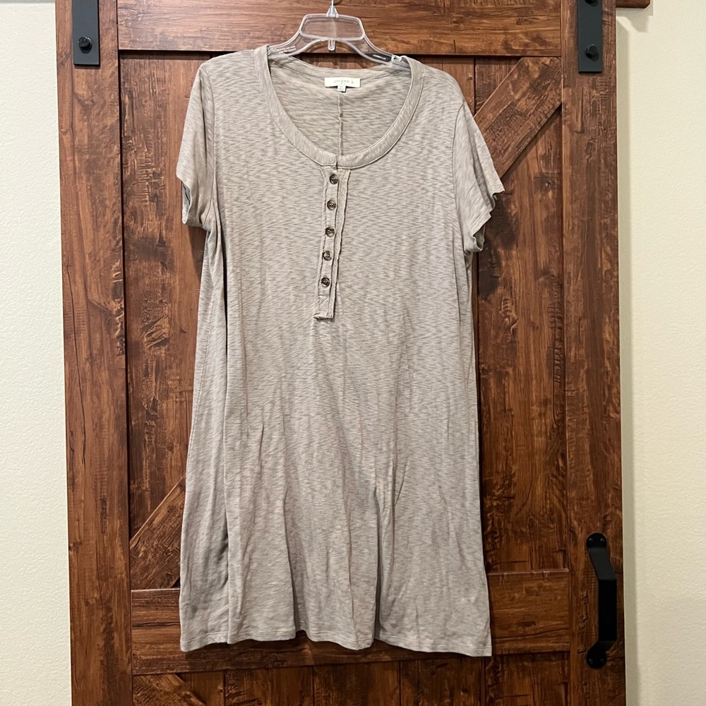 Women’s tee shirt dress with cute button details!
